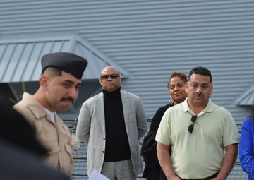 A touching moment during a re-enlistment ceremony aboard Battleship Wisconsin