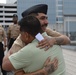 A touching moment during a re-enlistment ceremony aboard Battleship Wisconsin