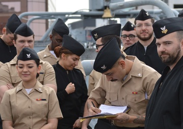 Naval Museum hosts a re-enlistment ceremony aboard Battleship Wisconsin