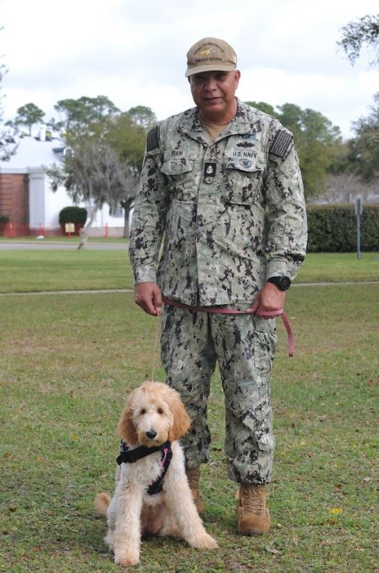 Retiring Navy Chief Receives Service Dog to Help with Stress