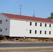 Contractors prepare second round of World War II-era barracks buildings to be moved at Fort McCoy