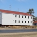 Contractors prepare second round of World War II-era barracks buildings to be moved at Fort McCoy