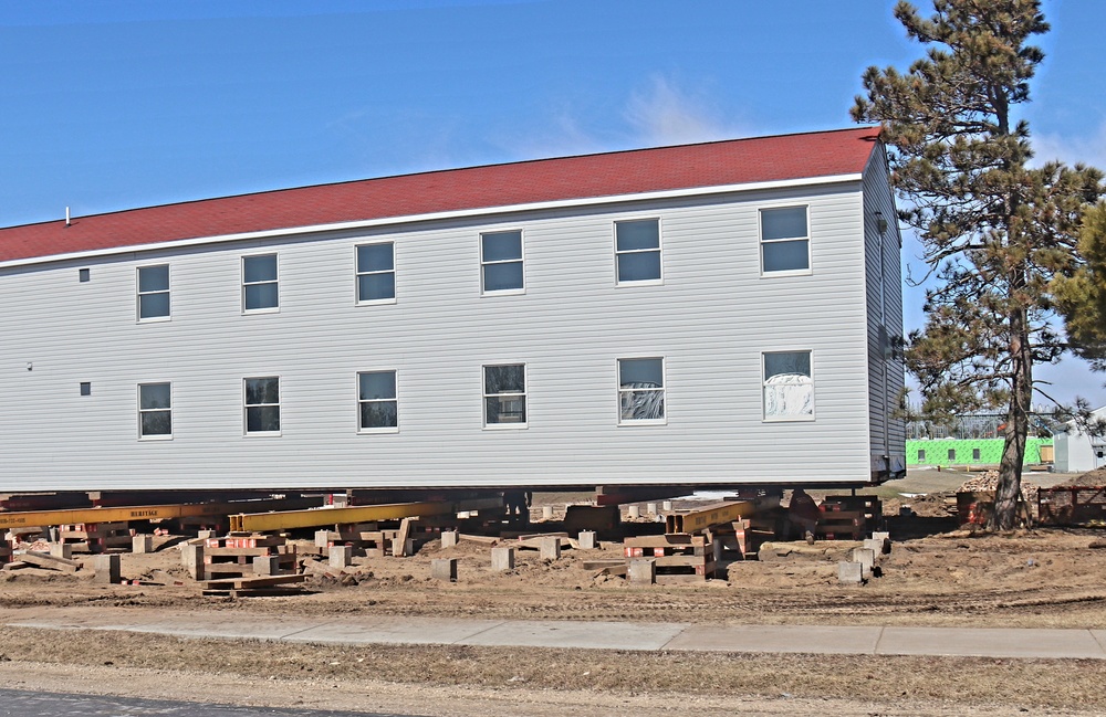 Contractors prepare second round of World War II-era barracks buildings to be moved at Fort McCoy