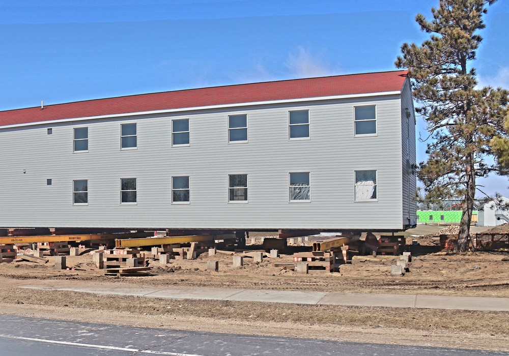 Contractors prepare second round of World War II-era barracks buildings to be moved at Fort McCoy