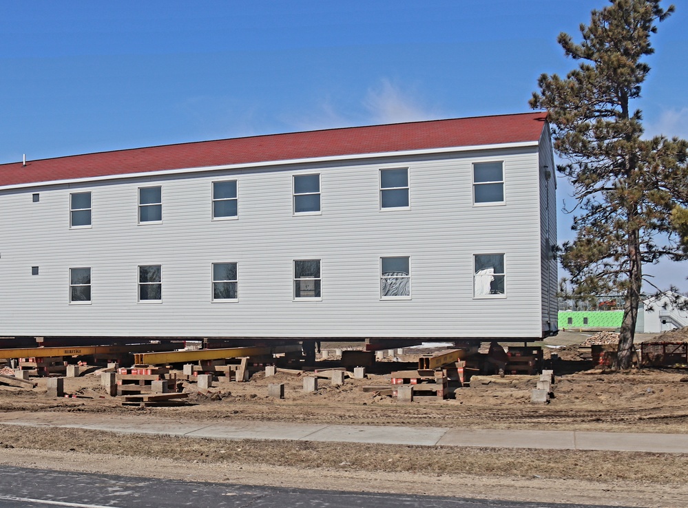 Contractors prepare second round of World War II-era barracks buildings to be moved at Fort McCoy