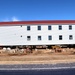 Contractors prepare second round of World War II-era barracks buildings to be moved at Fort McCoy