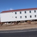 Contractors prepare second round of World War II-era barracks buildings to be moved at Fort McCoy