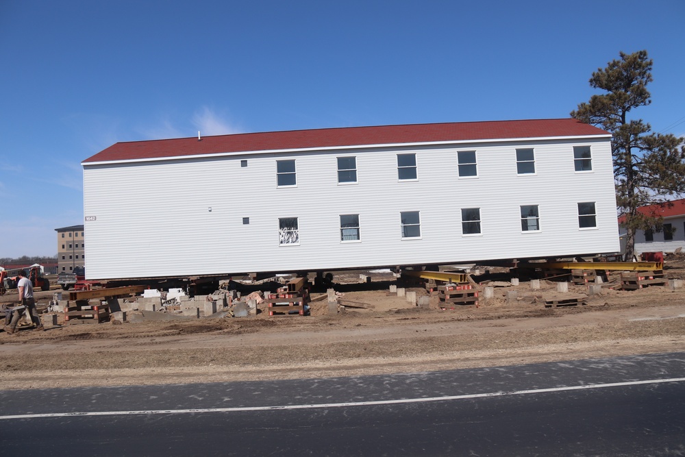 Contractors prepare second round of World War II-era barracks buildings to be moved at Fort McCoy