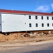 Contractors prepare second round of World War II-era barracks buildings to be moved at Fort McCoy