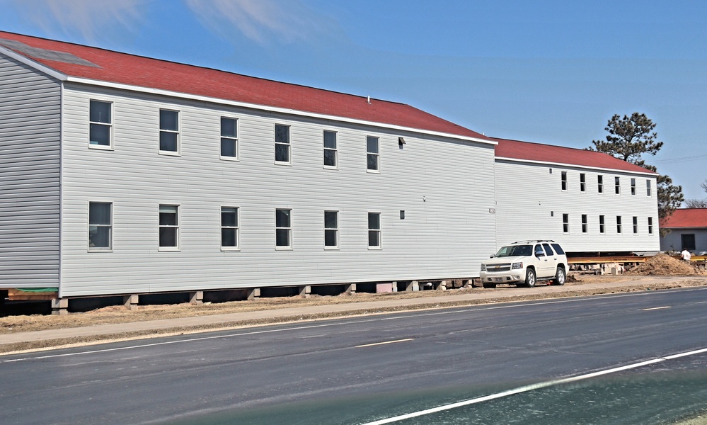 Contractors prepare second round of World War II-era barracks buildings to be moved at Fort McCoy