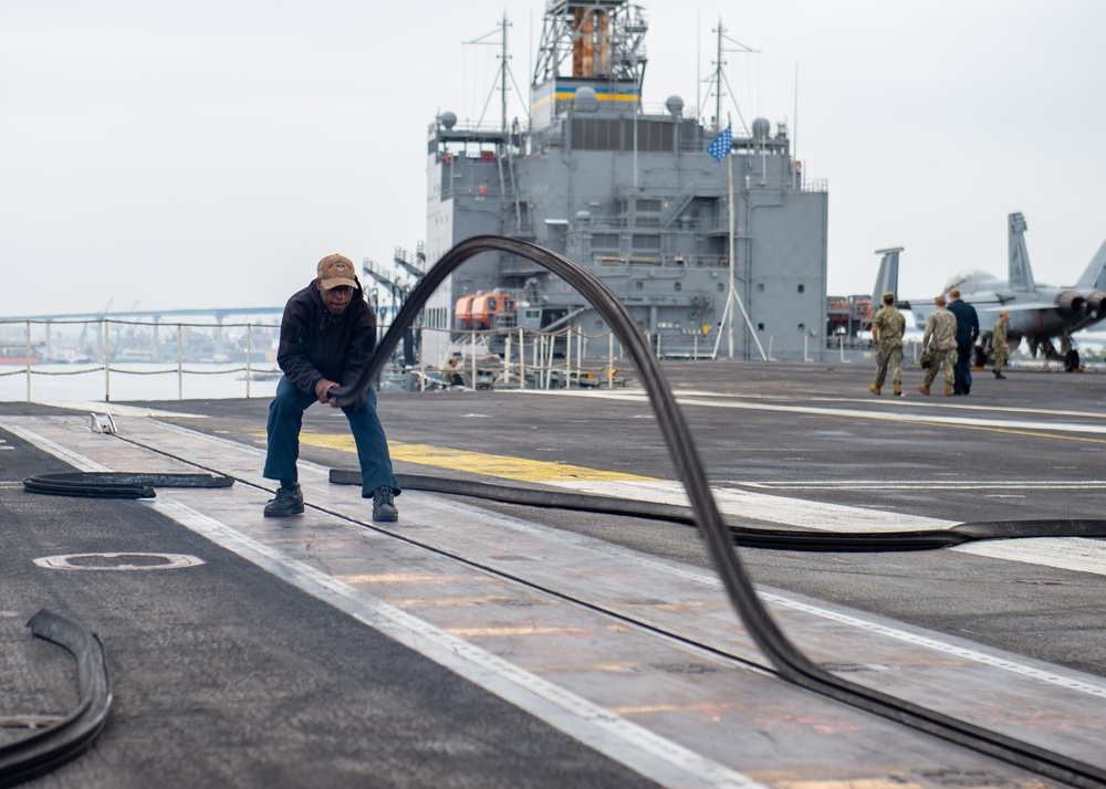 USS Carl Vinson (CVN 70) Sailors Conduct Flight Deck Maintenance