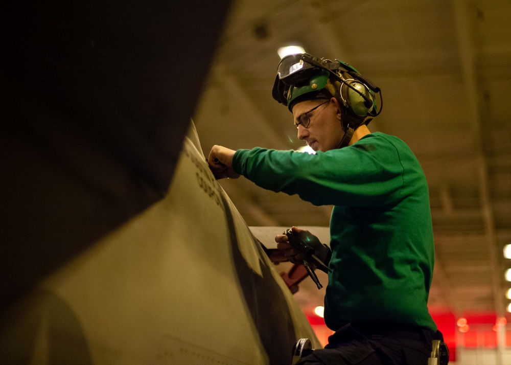 Strike Fighter Squadron (VFA) 2 Sailor Conducts Maintenance Aboard USS Carl Vinson (CVN 70)