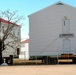 Contractor moves first two World War II-era barracks at Fort McCoy