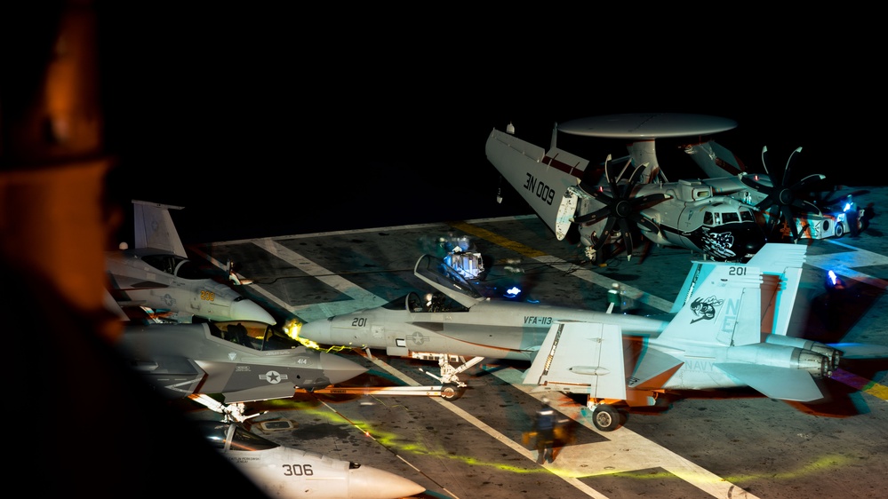 Aircraft is moved on the Flight Deck of USS Carl Vinson (CVN70)