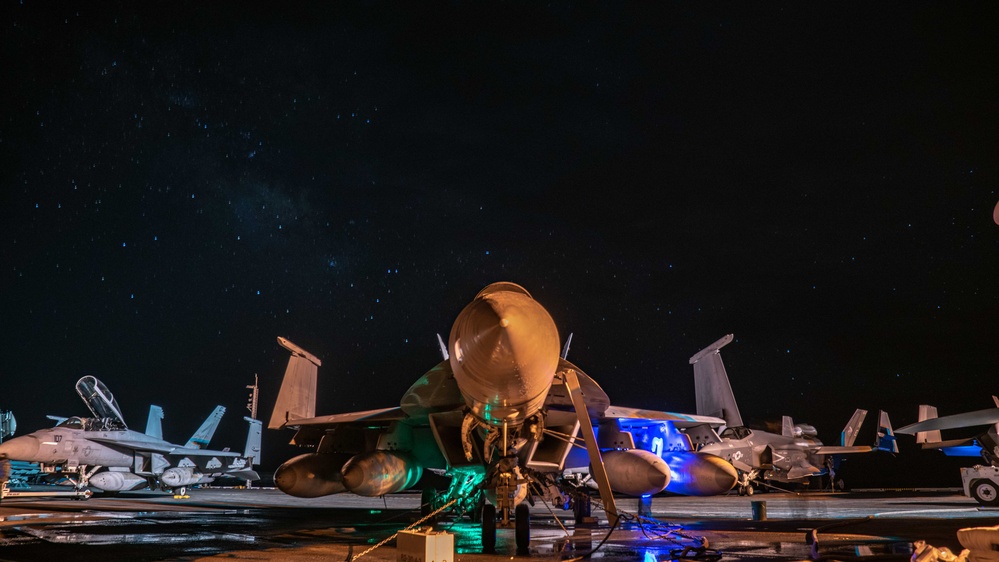 Sailors Conduct Maintenance on an F/A-18E Super Hornet