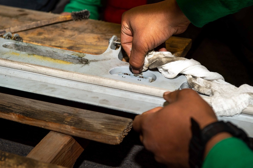 Electronic Attack Squadron (VAQ) 136 Sailors Perform Maintenance Aboard USS Carl Vinson (CVN 70)