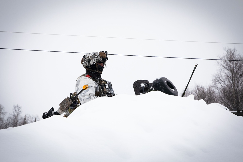 11th Airborne Division Soldiers stand guard during JPMRC-AK 23-02