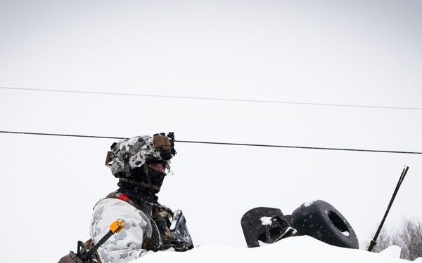 11th Airborne Division Soldiers stand guard during JPMRC-AK 23-02