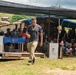 Solomon Islanders and DPAA Members celebrate the end of a Recovery Mission