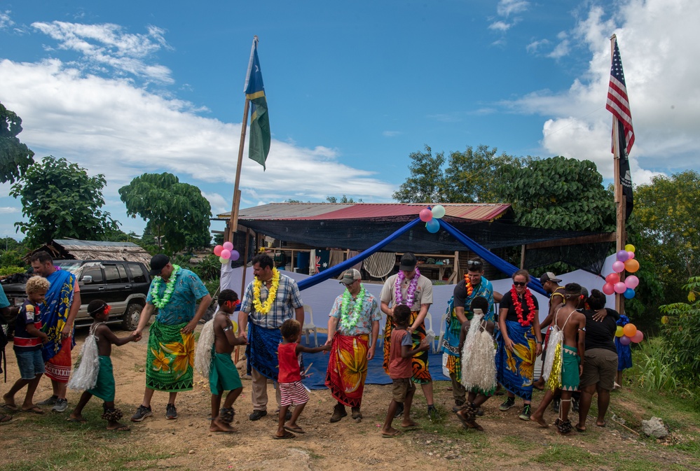 Solomon Islanders and DPAA Members celebrate the end of a Recovery Mission