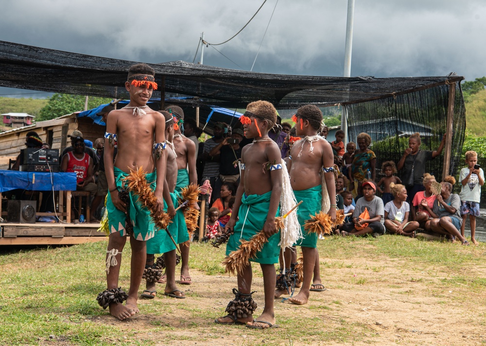 Solomon Islanders and DPAA Members celebrate the end of a Recovery Mission