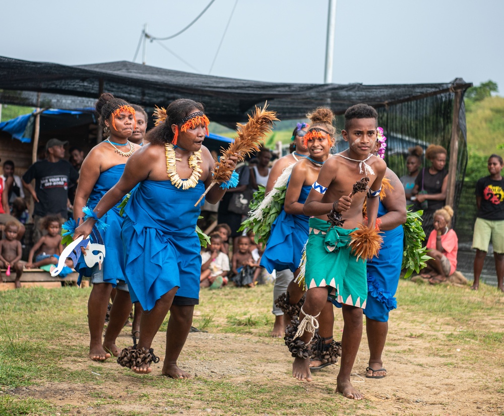 Solomon Islanders and DPAA Members celebrate the end of a Recovery Mission