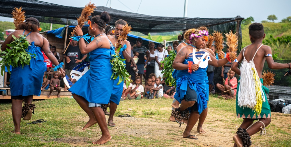 Solomon Islanders and DPAA Members celebrate the end of a Recovery Mission