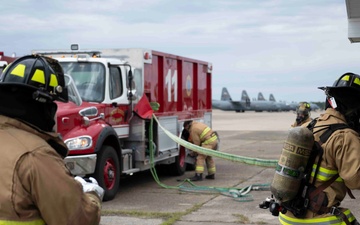 130th Airlift Wing Fire and Emergency Services perform search and rescue inside a simulated structure fire