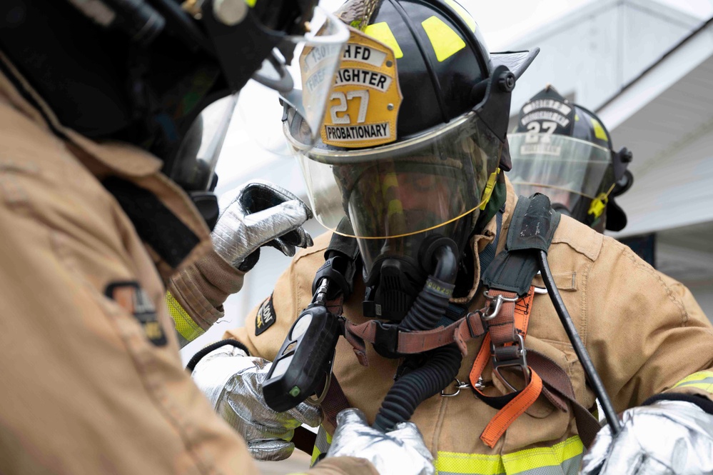 130th Airlift Wing Fire and Emergency Services perform Search and Rescue inside a simulated structure fire