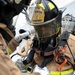 130th Airlift Wing Fire and Emergency Services perform Search and Rescue inside a simulated structure fire