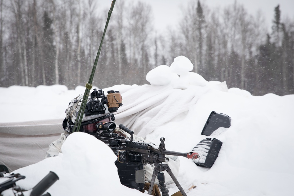 11th Airborne Division Soldiers stand guard during JPMRC-AK 23-02