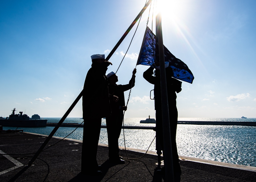 Sailors Lower The Union Jack