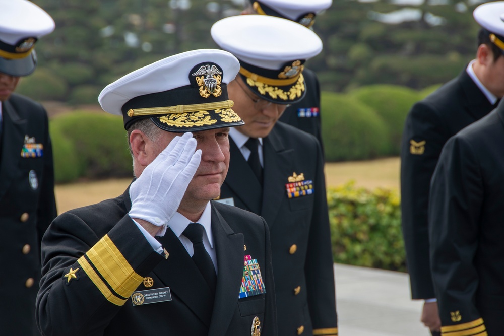 Rear Adm. Sweeney Visits The United Nations Memorial In ROK