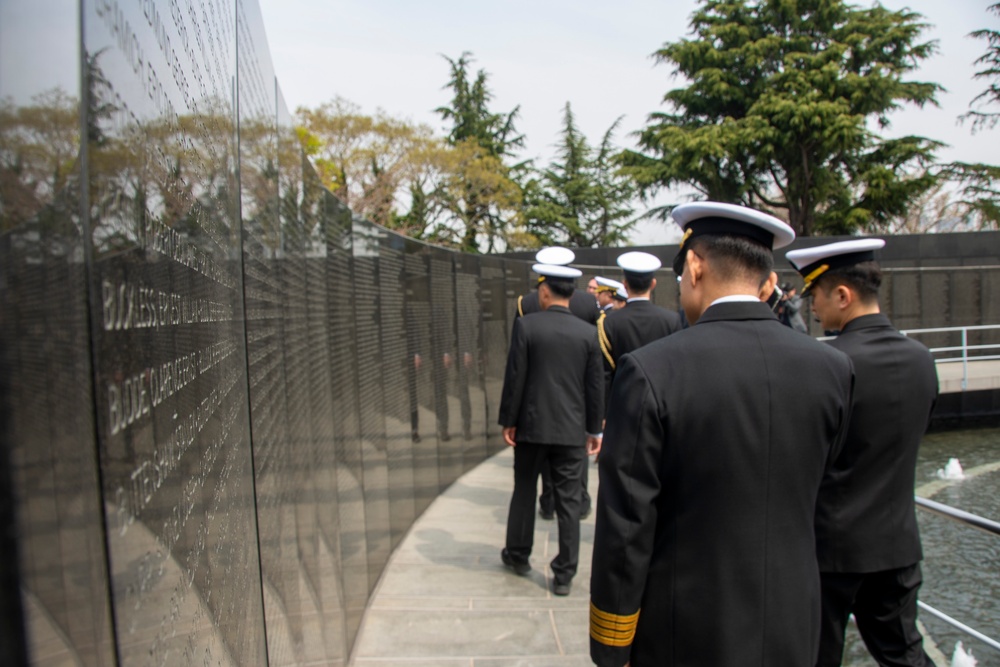 Rear Adm. Sweeney Visits The United Nations Memorial In ROK