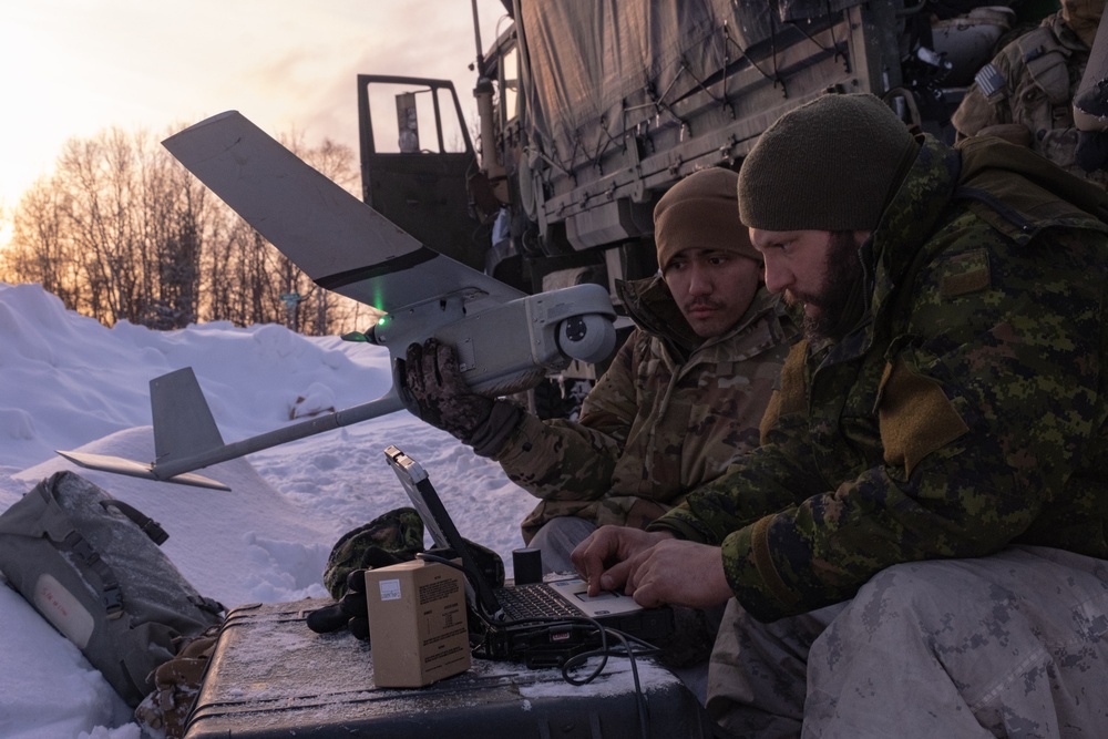 Preparing to launch a Raven UAV at JPMRC-AK 23-02