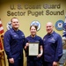 Coast Guard member meritoriously promoted for devotion to duty and social work benefiting children in need