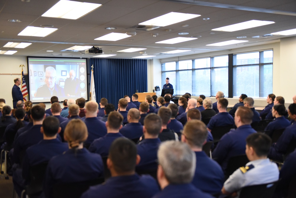 Coast Guard service member meritoriously promoted for devotion to duty and social work benefiting children in need