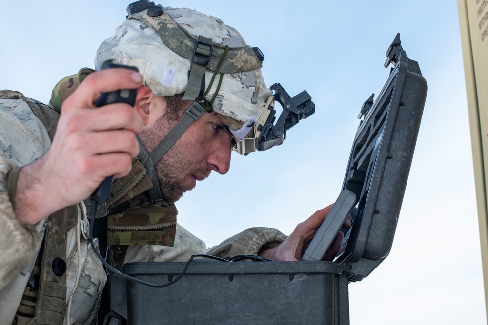 11th Airborne Division Soldiers operate a Black Hornet drone at remote fighting positions