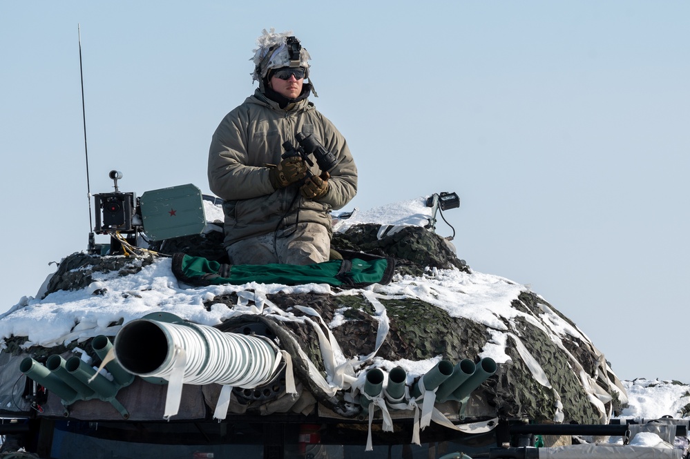 11th Airborne Division Soldiers maintain watch at remote fighting positions