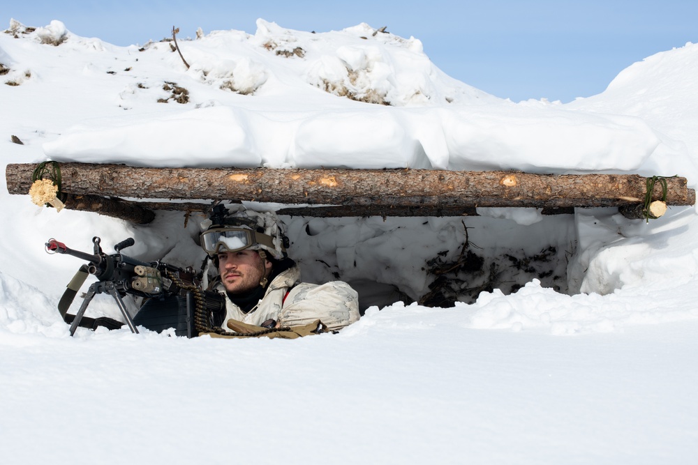 11th Airborne Division Soldiers occupy remote fighting positions