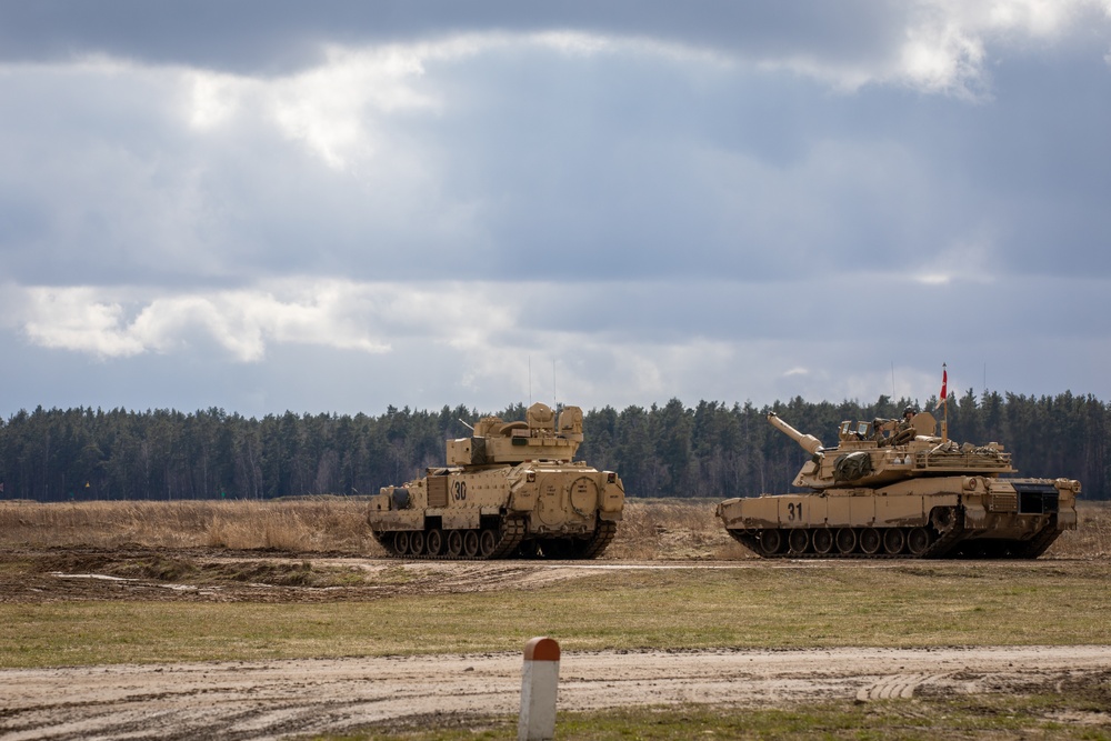 German Leopards and 1-9 CAV Apache Co. Abrams Tanks Charge the Field in Poland