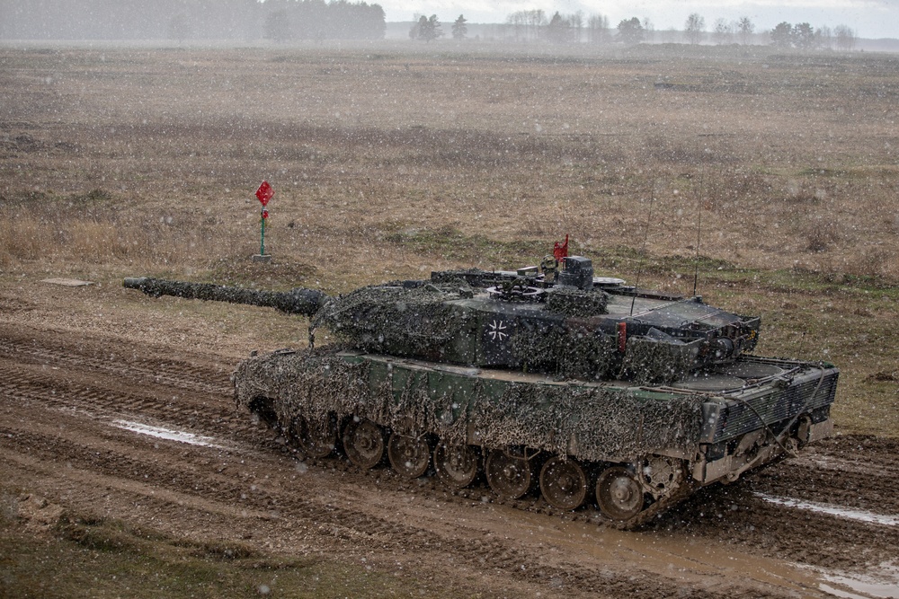 German Leopards and 1-9 CAV Apache Co. Abrams Tanks Charge the Field in Poland