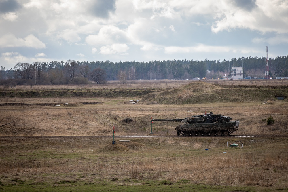 German Leopards and 1-9 CAV Apache Co. Abrams Tanks Charge the Field in Poland