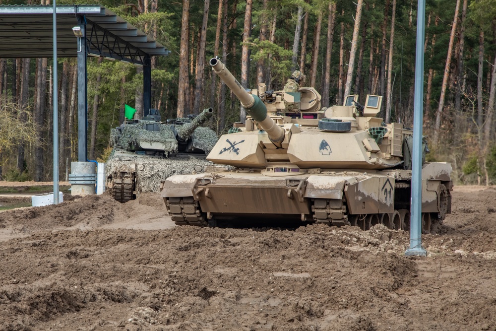 German Leopards and 1-9 CAV Apache Co. Abrams Tanks Charge the Field in Poland