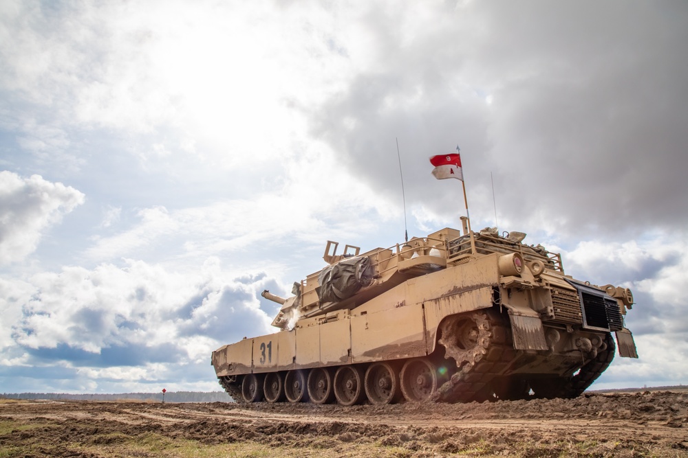 German Leopards and 1-9 CAV Apache Co. Abrams Tanks Charge the Field in Poland