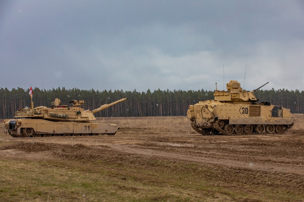 German Leopards and 1-9 CAV Apache Co. Abrams Tanks Charge the Field in Poland