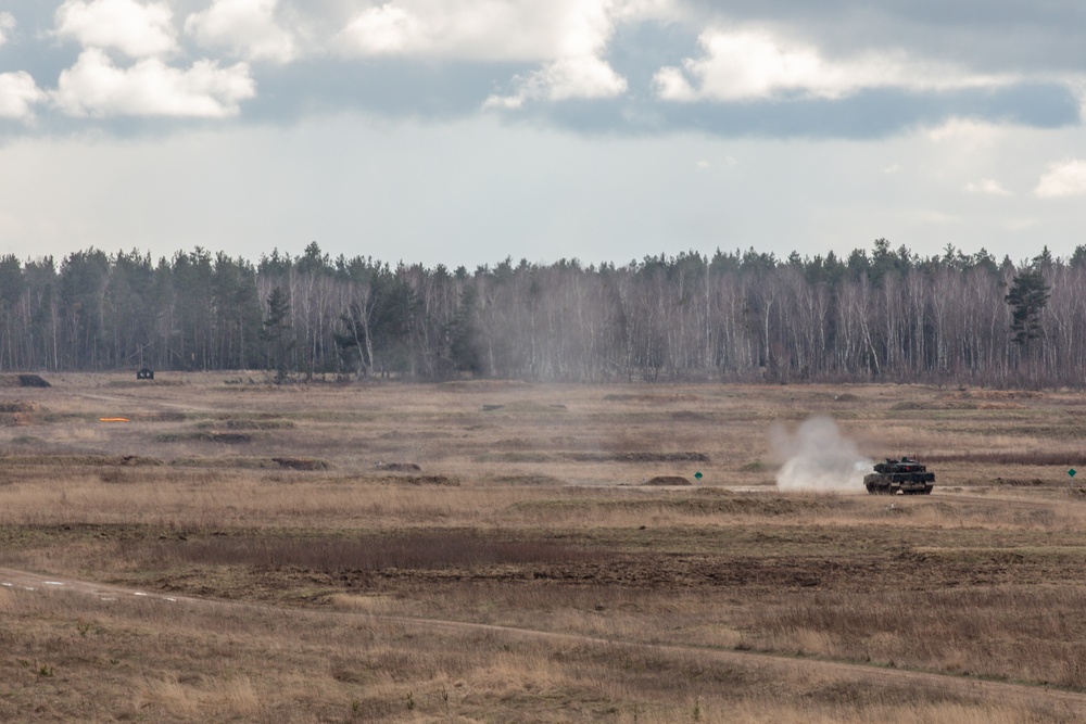 German Leopards and 1-9 CAV Apache Co. Abrams Tanks Charge the Field in Poland