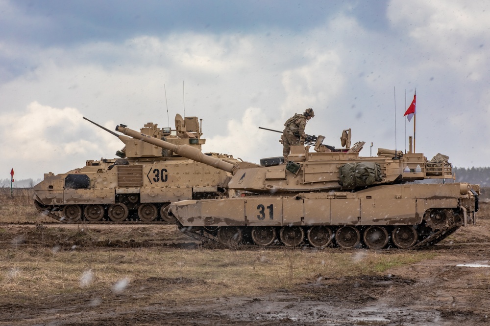 German Leopards and 1-9 CAV Apache Co. Abrams Tanks Charge the Field in Poland