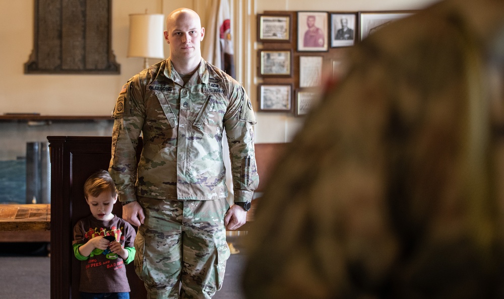 Soldiers from the Polish Territorial Defense Force present Bronze Polish Army Medals to ILARNG Soldiers