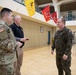 Soldiers from the Polish Territorial Defense Force present Bronze Polish Army Medals to ILARNG Soldiers